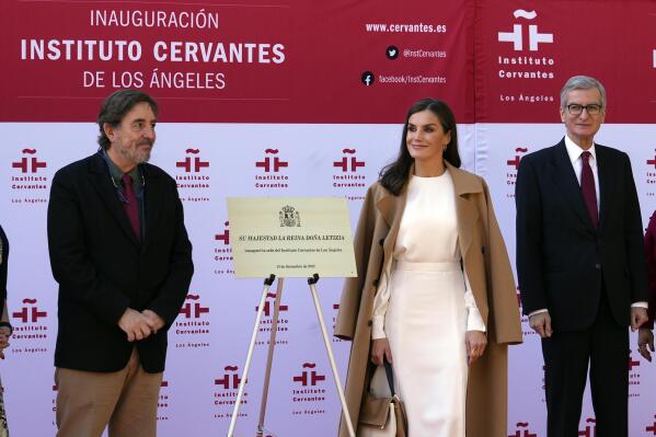 Spain's Queen Letizia attends the inauguration and plaque unveiling of The Instituto Cervantes in Los Angeles, Tuesday, Dec. 13, 2022. Luis García Montero, director of the Cervantes Institute, left, Queen Letizia, Santiago Cabanas, Spanish Ambassador to the United States. (AP Photo/Damian Dovarganes)