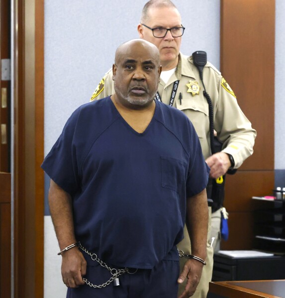 Duane “Keffe D” Davis, who is accused of orchestrating the 1996 slaying of hip-hop icon Tupac Shakur, is led into the courtroom during a status hearing at the Regional Justice Center, on Tuesday, April 23, 2024, in Las Vegas. (Bizuayehu Tesfaye/Las Vegas Review-Journal via AP)