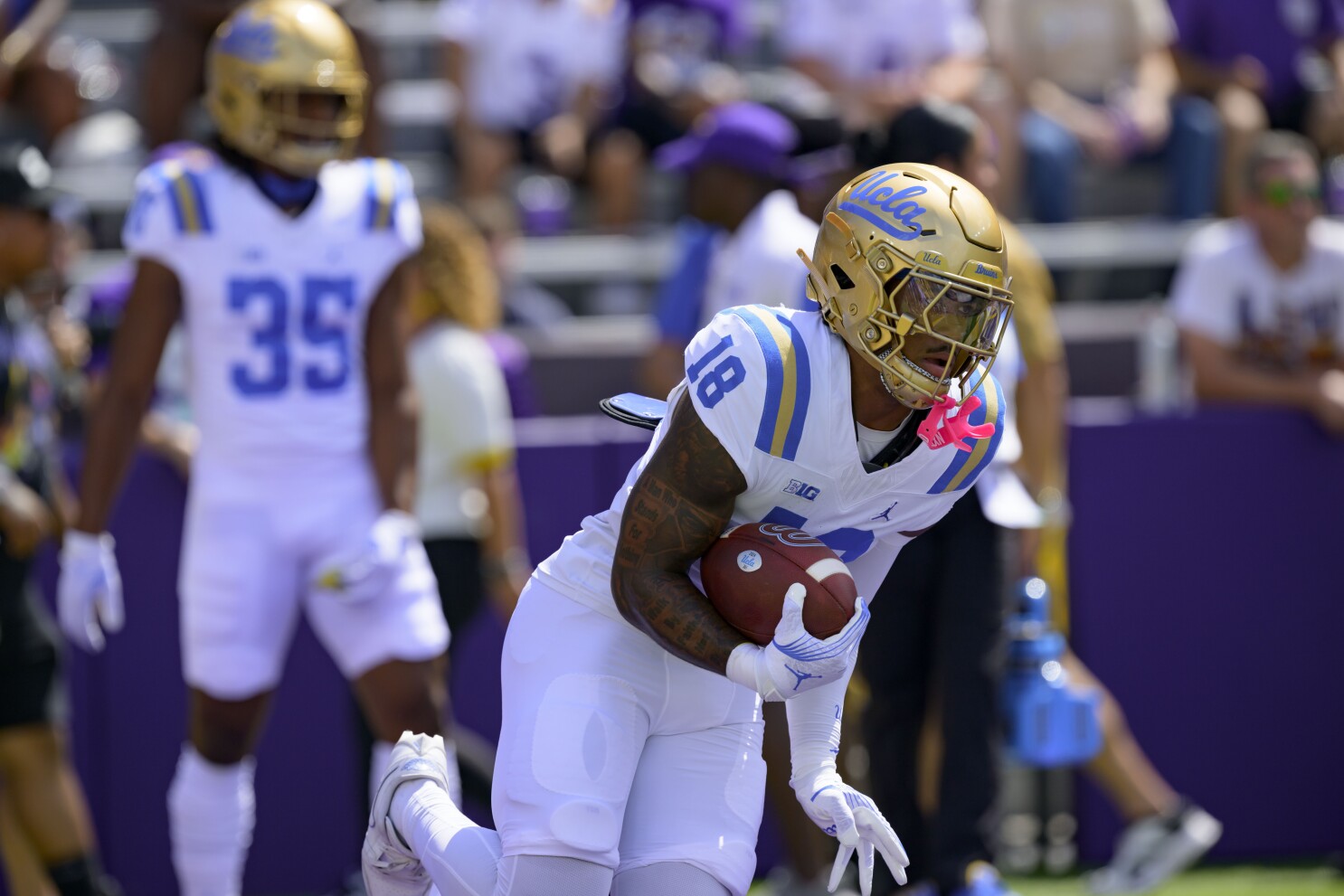 Here are 18 football players to watch next season in the Big Ten Conference