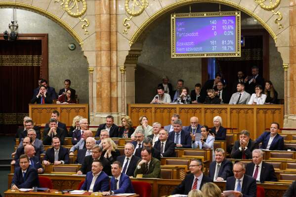 Hungary’s parliament has passed an amendment to the constitution that allows the government to ban public events by LGBTQ+ communities, in Budapest, Hungary, Monday, April 14, 2025. (Robert Hegedus/MTI via AP)