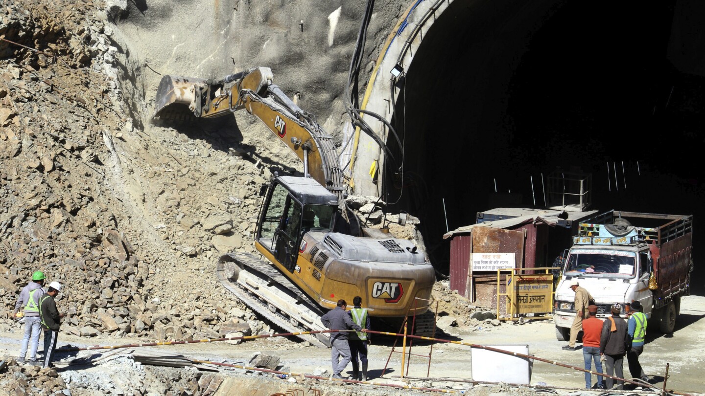 41 workers in India are stuck in a tunnel for an 8th day. Officials consider alternate rescue plans