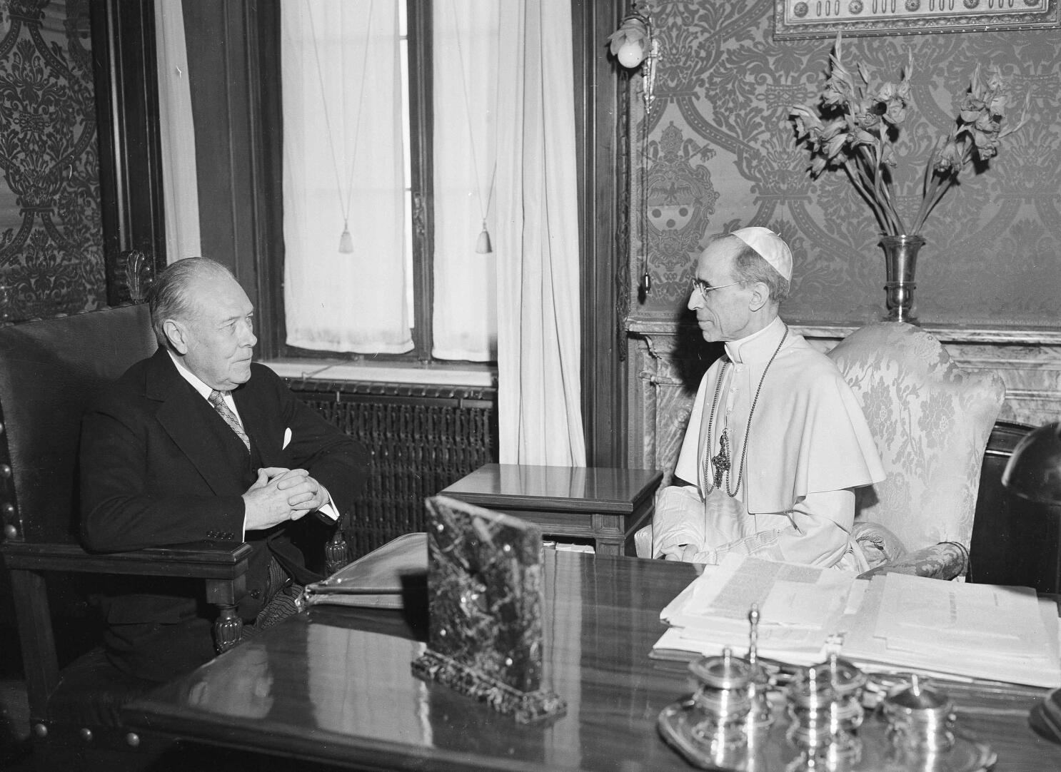 Pius XII archives begin to shed light on WWII pope AP News