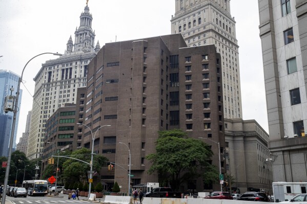 FILE - The Metropolitan Correctional Center in New York, Aug. 13, 2019. The Justice Department’s watchdog said Tuesday that “a combination of negligence and misconduct” enabled Jeffrey Epstein to take his own life at a federal jail in New York City. (AP Photo/Mary Altaffer, File)