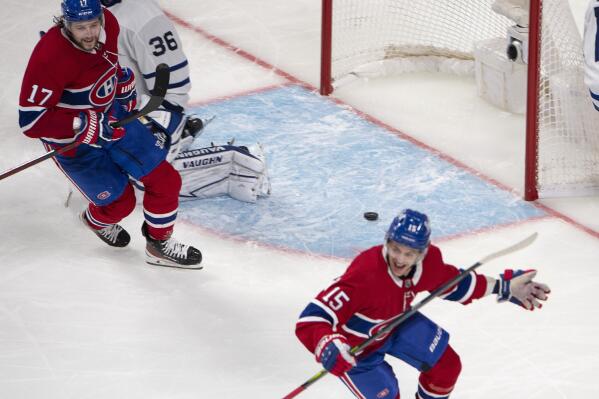 Montreal Canadiens' Jesperi Kotkaniemi (15) reacts after scoring in overtime on Toronto Maple Leafs goaltender Jack Campbell (36) in Game 6 of an NHL hockey Stanley Cup first-round playoff seres Saturday, May 29, 2021, in Montreal. (Ryan Remiorz/The Canadian Press via AP)