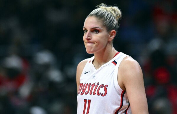 FILE - Washington Mystics' Elena Delle Donne (11) looks on during a break in the action in the first half of a WNBA basketball game against the Indiana Fever, Friday, May 6, 2022, in Washington. The Mystics star, a two-time WNBA MVP, might step away from basketball for an undetermined period of time, according to multiple reports. ESPN, citing anonymous sources, reported Wednesday, Feb. 7, 2024, that Delle Donne does not intend to sign the one-year supermax deal the Mystics have offered her. (AP Photo/Terrance Williams, File)