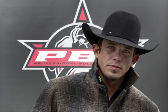 FILE - Professional Bull Riders 2015 champion J.B. Mauney appears outside New York's Madison Square Garden, Jan. 14, 2016. Mauney announced his retirement Tuesday, Sept. 12, 2023, a week after breaking his neck in the Lewiston Roundup. The 36-year-old Mauney said on Instagram he had surgery at St. Joseph Regional Medical Center in Lewiston, Idaho, that required the removal of a disk. (AP Photo/Richard Drew, File)
