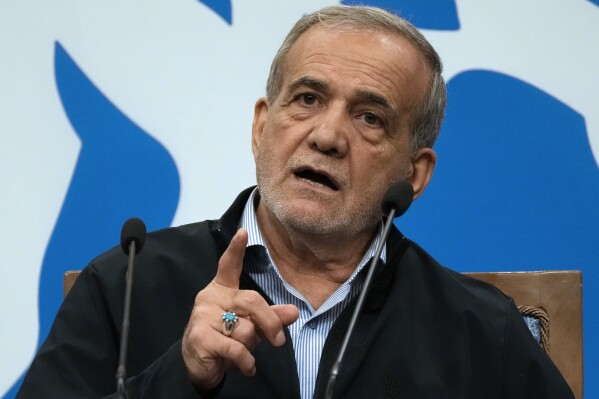 Iranian President Masoud Pezeshkian speaks during a press conference in Tehran, Iran, Monday, Sept. 16, 2024. (AP Photo/Vahid Salemi)