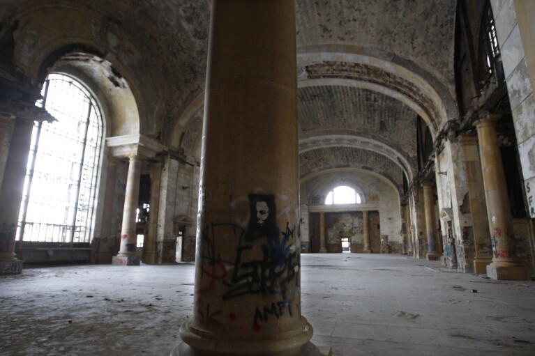 FILE- The interior of the Michigan Central Station is seen, Thursday, Jan. 21, 2010 in Detroit. A once hulking scavenger-ravaged monolith that symbolized Detroit's decline reopens this week after a massive six-year multimillion dollar renovation by Ford Motor Co., which restored the Michigan Central Station to its past grandeur with a focus squarely on the future of mobility. (AP Photo/Carlos Osorio_File)