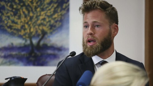 FILE - Owen Shroyer, an InfoWars host and sometimes reporter who is a frequent guest on the Alex Jones Show, testifies during Jones' defamation damages trial at the Travis County Courthouse, July 29, 2022, in Austin, Texas. Infowars host Owen Shroyer, who promoted baseless claims of 2020 election fraud on the far-right internet platform, pleaded guilty on Friday, June 23, 2023, to joining the mob of Donald Trump supporters who rioted at the U.S. Capitol. (Briana Sanchez/Austin American-Statesman via AP, Pool, File)