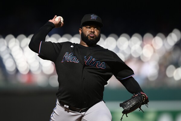 Miami Marlins starting pitcher Johnny Cueto throws during the first inning of a baseball game against the Washington Nationals, Saturday, Sept. 2, 2023, in Washington. (AP Photo/Nick Wass)