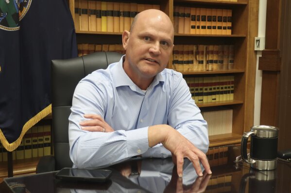 Kansas Secretary of State Scott Schwab discusses his newly launched campaign for the Republican nomination for governor during an interview with The Associated Press, Wednesday, Jan. 8, 2025, in Topeka, Kan. (AP Photo/John Hanna)