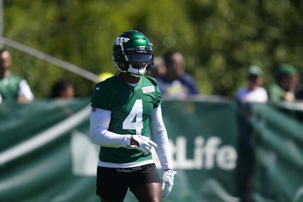 FILE - New York Jets' D.J. Reed takes part in drills at the NFL football team's practice facility, July 30, 2022, in Florham Park, N.J. The New York Jets cornerback learned his father had died Sunday, Sept. 11, 2022, morning after an 18-year battle with multiple sclerosis, and he is dedicating this season to him.  (AP Photo/Frank Franklin II, File)