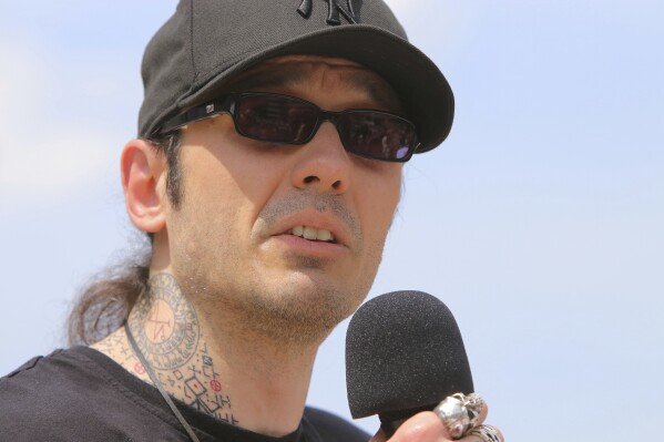 FILE - Former Arkansas death row inmate Damien Echols speaks at rally opposing the state's upcoming executions, on the front steps of Arkansas' Capitol, Friday, April 14, 2017, in Little Rock, Ark. The Arkansas Supreme Court on Thursday, April 18, 2024, said a judge wrongly denied a request from Echols for new genetic testing of crime scene evidence from the killing of three boys nearly 30 years ago. (Stephen B. Thornton/The Arkansas Democrat-Gazette via AP, File)