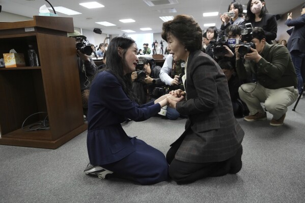 Truth and Reconciliation Commission Chairperson Park Sun Young, right, comforts adoptee Yooree Kim during a press conference in Seoul, South Korea, March 26, 2025. (AP Photo/Ahn Young-joon, File)