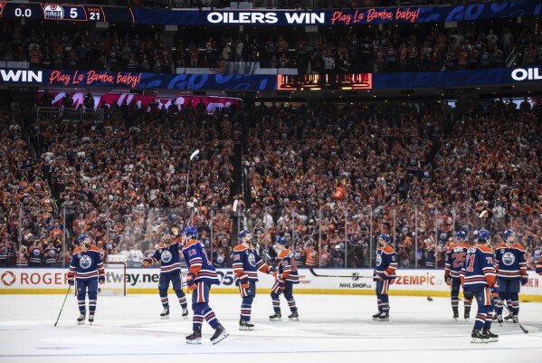 Edmonton Oilers celebrate a win over the Florida Panthers in Game 6 of the NHL hockey Stanley Cup Final, Friday, June 21, 2024, in Edmonton, Alberta. The Oilers won 5-1 to tie the series. (Jason Franson/The Canadian Press via AP)