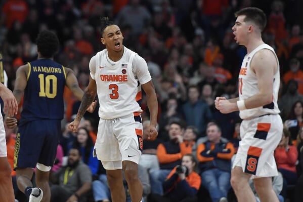 Syracuse guard Judah Mintz (3) celebrates with guard Joseph Girard III after the team's win over Notre Dame in an NCAA college basketball game in Syracuse, N.Y., Saturday, Jan. 14, 2023. (AP Photo/Adrian Kraus)