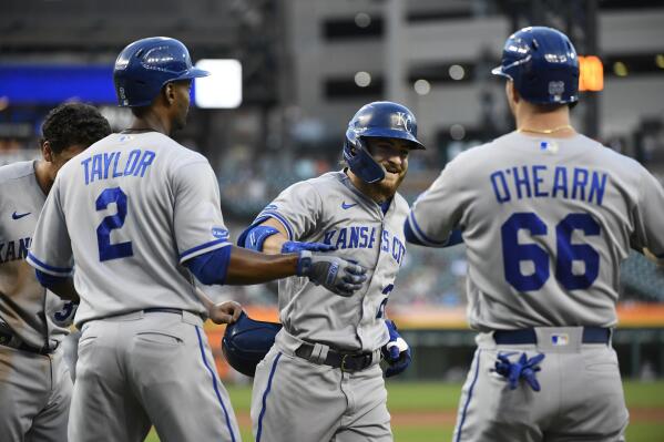 Kansas City Royals' Kyle Isbel, second from right, is congratualted after hitting a grand slam, scoring Nick Pratto, left, Michael A. Taylor and Ryan O'Hearn during the fifth inning of a baseball game against the Detroit Tigers, Saturday, Sept. 3, 2022, in Detroit. (AP Photo/Jose Juarez)
