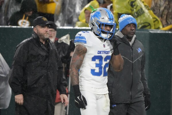 Lions safety Brian Branch ejected after helmet-to-helmet hit on Packers' Bo Melton | AP News