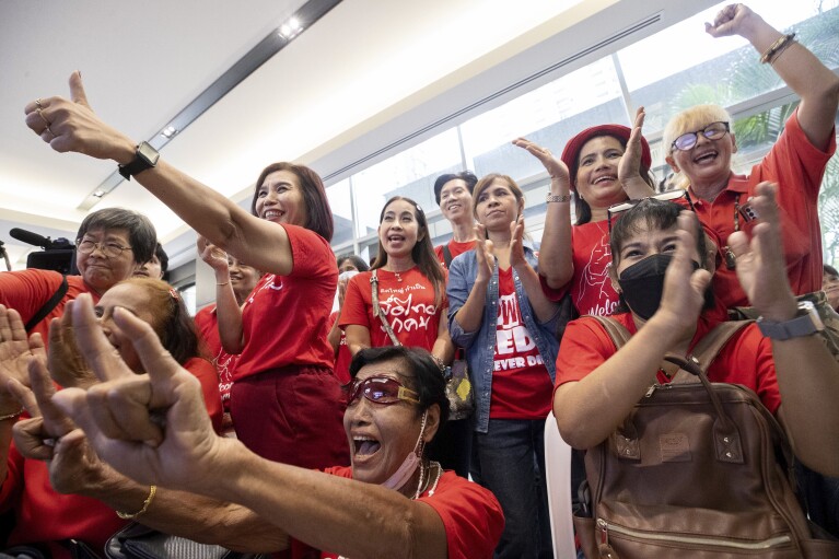 Pheu Thai supporters react during a parliamentary vote on Srettha Thavisin's prime ministerial candidacy, at the party headquarters in Bangkok, Thailand, Tuesday, Aug. 22, 2023. (AP Photo/Wason Wanichakorn)