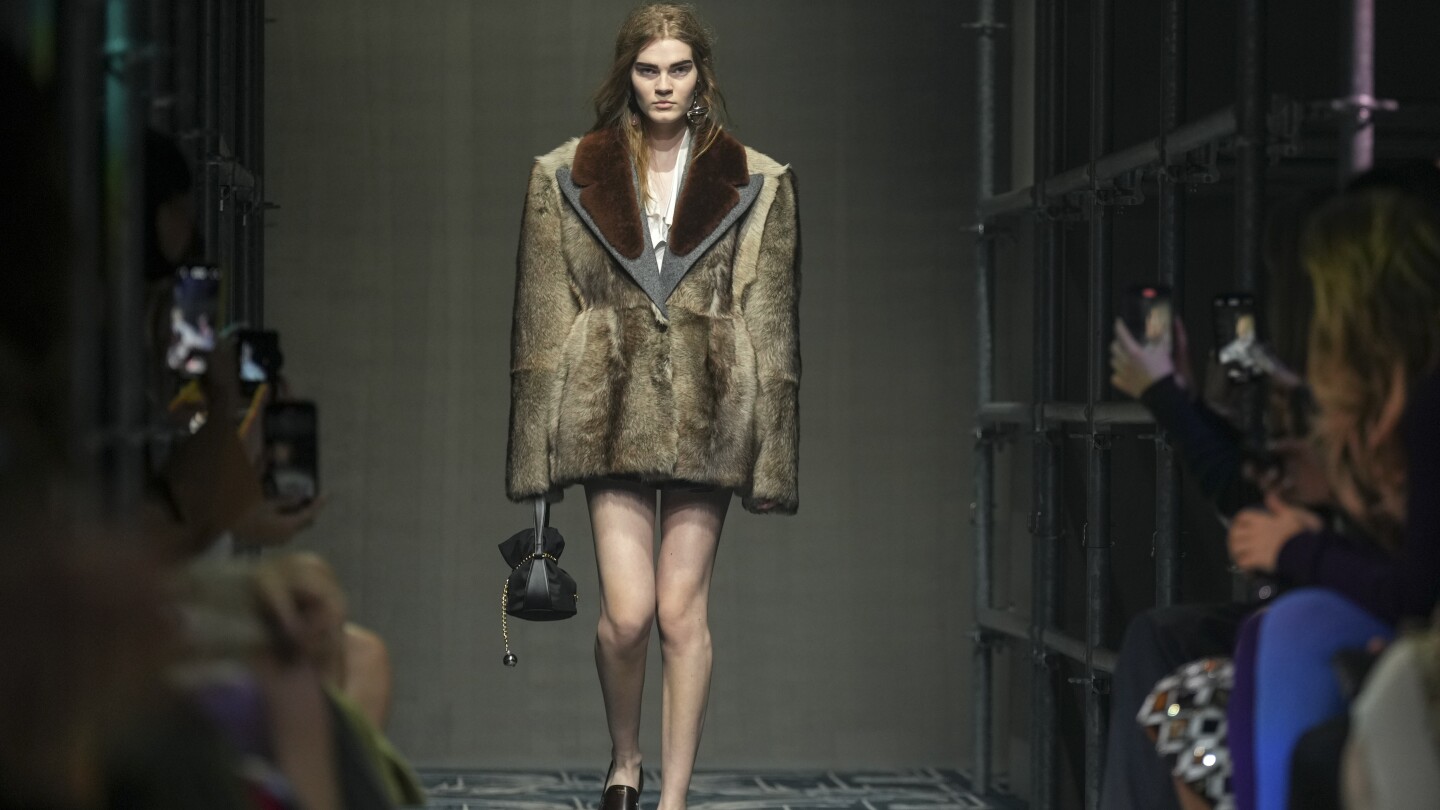 Prada reconstructs femininity starting with the little black dress fit for a global 'black moment'