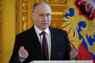 Russia President Vladimir Putin delivers a speech as he meets his authorised representatives for the presidential election campaign in the Andreyevsky Hall of the Great Kremlin Palace, in Moscow, Russia, Wednesday, March 20, 2024. (AP Photo/Alexander Zemlianichenko)