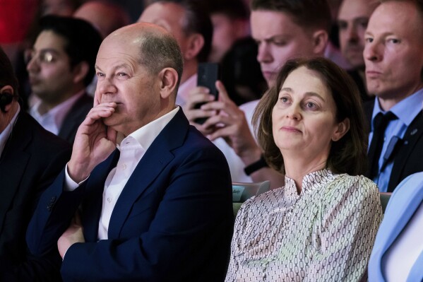 German Federal Chancellor Olaf Scholz, left and SPD lead candidate for the European elections, Katarina Barley, listen, during Party of European Socialists (PES) Democracy Congress, in Berlin, Saturday, May 4, 2024. (Christoph Soeder/dpa via Ǻ)