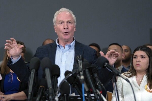 Sen. Chris Van Hollen, D-Md., speaks during a news conference upon his arrival from meeting with Kilmar Abrego Garcia in El Salvador, at Washington Dulles International Airport, in Chantilly, Va., Friday, April 18, 2025. (AP Photo/Jose Luis Magana)