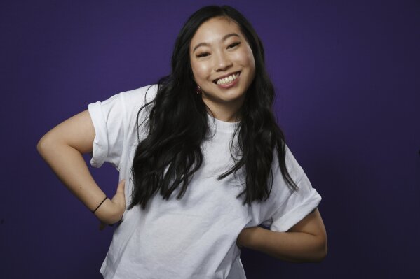 
              In this Dec. 5, 2018 photo, actress-rapper Awkwafina poses for a portrait in Los Angeles. Awkwafina, who appeared in the film, "Crazy Rich Asians," was named as one of eight Breakthrough Entertainers of the Year by the Associated Press. (Photo by Chris Pizzello/Invision/AP)
            
