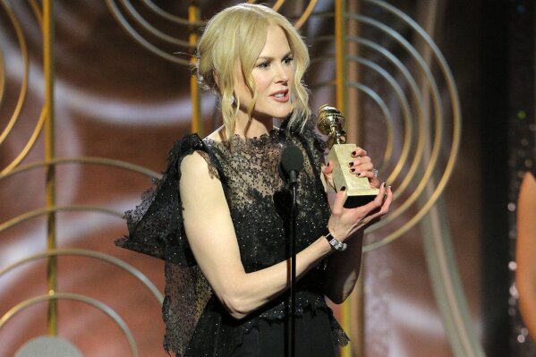 
              This image released by NBC shows Nicole Kidman accepting the award for best performance by an actress in a limited series or motion picture made for TV for her role in "Big Little Lies," at the 75th Annual Golden Globe Awards in beverly Hills, Calif., on Sunday, Jan. 7, 2018. (Paul Drinkwater/NBC via AP)
            