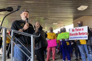 FILE - Bruce Marks, CEO of the Neighborhood Assistance Corporation of America, speaks at a rally on Tuesday, Nov. 16, 2021 in Atlanta demanding Georgia officials speed up the distribution of rental assistance. Georgia officials struggling to distribute federal funds to prevent evictions have outlined plans to increase the speed at which they get the money to landlords and renters. The improvement plans were submitted last week to the U.S. Department of the Treasury. (AP Photo/Sudhin Thanawala, File)