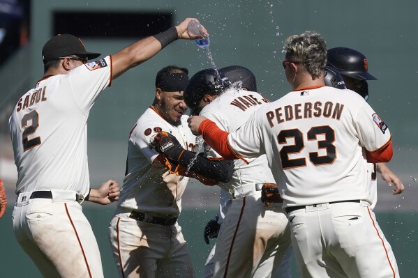 Davis homers, Wade hits winning sac fly as Giants rally past Guardians 6-5  in 10