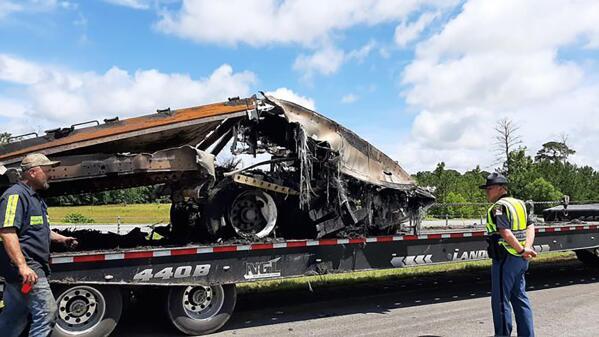 Some of the wreckage from a fatal multiple-vehicle crash a day earlier is loaded to be carried away, Sunday, June 20, 2021, in Butler County, Ala. (Lawrence Specker/Press-Register/AL.com via AP)