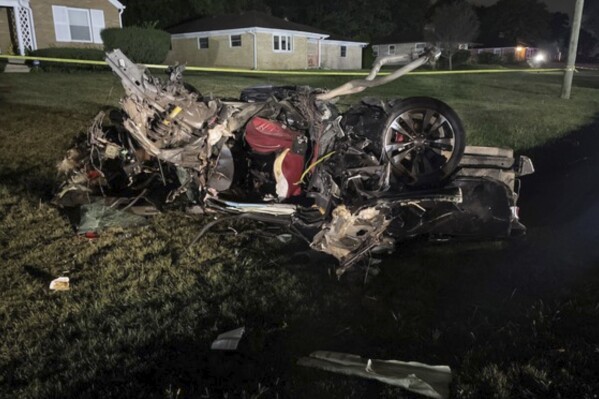 This photo provided by the Indiana State Police shows a vehicle that was heavily damaged in a crash that killed three people, Tuesday night, Sept. 26, 2023, in Indianapolis. The crash occurred minutes after police had called off a pursuit of one of the vehicles which they had been chasing for reckless driving. (Indiana State Police via AP)