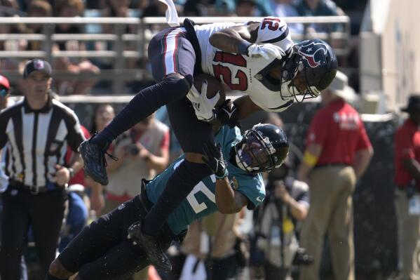 Pierce's run, Walker's gaffe help Texans topple Jags again