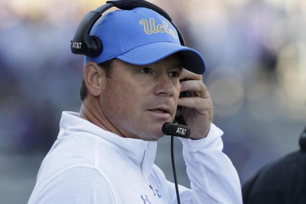 FILE - UCLA head coach Jim Mora looks toward the field in the first half of an NCAA college football game against Washington on Saturday, Oct. 28, 2017, in Seattle. On Thursday, Nov. 11, 2021, UConn hired former UCLA coach Jim Mora, who also coached two NFL teams, to lead the Huskies. Mora has been out of coaching and has been working as a television analyst after spending six seasons (2012-17) leading UCLA to a 46-30 record.(AP Photo/Elaine Thompson, File)