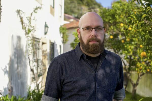 David Thiel, chief technologist at the Stanford Internet Observatory and author of its report that discovered images of child sexual abuse in the data used to train artificial intelligence image-generators, poses for a photo on Wednesday, Dec. 20, 2023 in Obidos, Portugal. (Camilla Mendes dos Santos via AP)