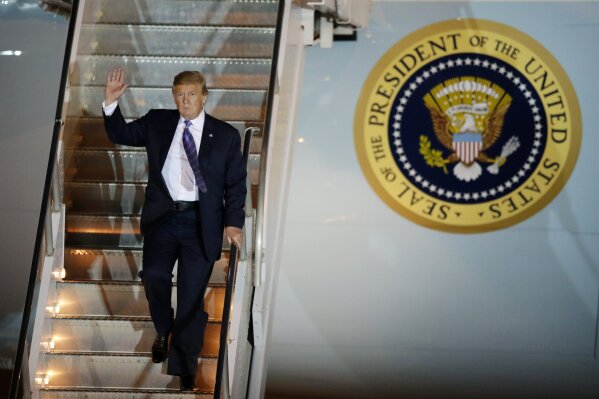 
              President Donald Trump disembarks from Air Force One after arriving at McCarran International Airport, Friday, April 5, 2019, in Las Vegas. Trump is scheduled to speak at the Republican Jewish Coalition National Leadership Meeting in Las Vegas Saturday. (AP Photo/John Locher)
            