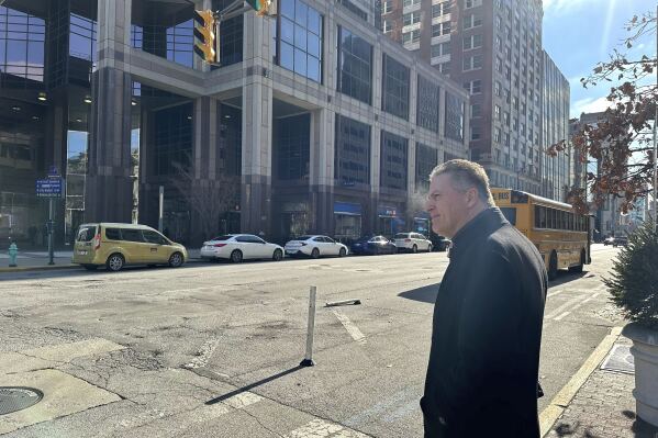 Former Indiana state Rep. Sean Eberhart, 57, leaves a hearing at the Birch Bayh Federal Building U.S. Courthouse, Tuesday, Nov. 28, 2023, in Indianapolis. Eberhart pleaded guilty before a federal judge to a fraud charge. He has been accused of accepting promises of lucrative employment from a casino company in return for favorable action during his time in the General Assembly in 2019. (AP Photo/Isabella Volmert)