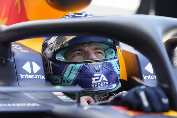 Red Bull driver Max Verstappen of the Netherlands removes his helmet as he finishes the third practice session of the Formula One Miami Grand Prix auto race, at Miami International Autodrome in Miami Gardens, Fla., Saturday, May 6, 2023. (AP Photo/Rebecca Blackwell)
