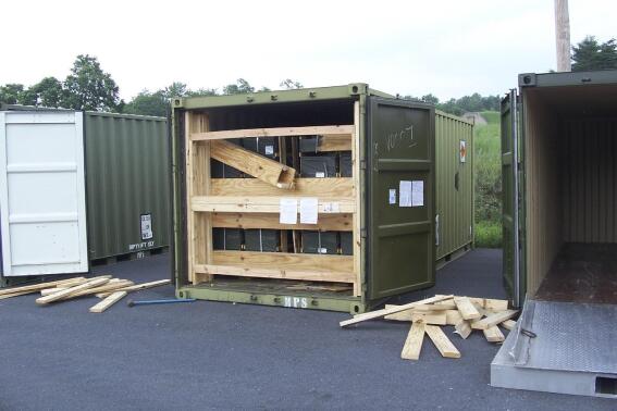 FILE - In this July 13, 2017, image provided by the U.S. Army Criminal Investigation Command on Feb. 9, 2021, a storage container of explosive ordnance shows signs of theft after arriving at the Letterkenny Army Depot in Chambersburg, Pa. An ammunition canister containing 32 rounds of 40mm M430A1 grenades, property of the U.S. Marine Corps, was missing. (U.S. Army Criminal Investigation Command via AP, File)