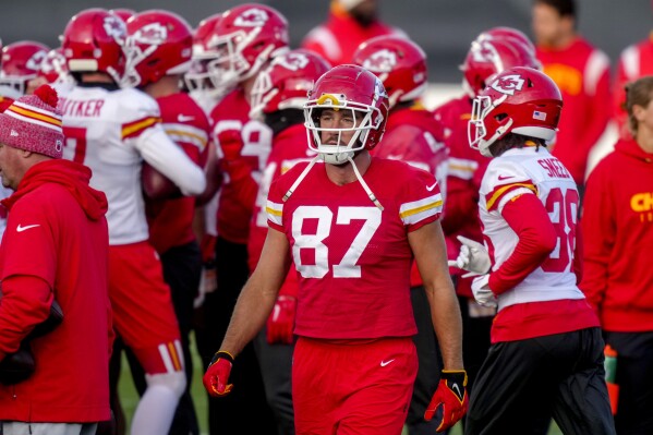 Kansas City Chiefs tight end Travis Kelce (87), centre, attends a practice session in Frankfurt, Germany, Friday, Nov. 3, 2023. The Kansas City Chiefs are set to play the Miami Dolphins in a NFL game in Frankfurt on Sunday Nov. 5, 2023. (AP Photo/Michael Probst)