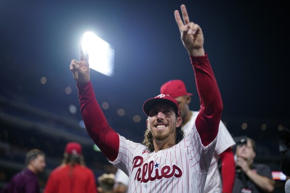 Philadelphia Phillies pitcher Michael Lorenzen celebrates after pitching a no-hitter during a baseball game against the Washington Nationals, Wednesday, Aug. 9, 2023, in Philadelphia. (AP Photo/Matt Slocum)