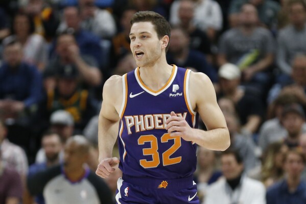 Phoenix Suns guard Jimmer Fredette (32) runs up court during the first half of an NBA basketball game against the Utah Jazz Monday, March 25, 2019, in Salt Lake City. (AP Photo/Rick Bowmer, FIle)