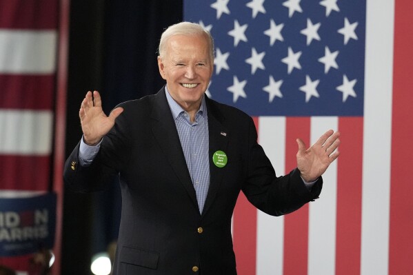FILE - President Joe Biden waves to supporters after speaking at a campaign event, March 9, 2024, in Atlanta. Biden has formally clinched a second straight Democratic nomination. Now his party’s presumptive nominee, he faces an all-but-certain rematch with former President Donald Trump. (AP Photo/Brynn Anderson, File)