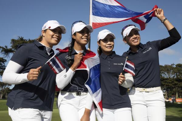 Team Thailand celebrates on the 15th green after winning the finals at the International Crown match play golf tournament in San Francisco, Sunday, May 7, 2023. (AP Photo/Benjamin Fanjoy)
