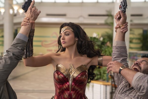 This image released by Warner Bros. Entertainment shows Gal Gadot in a scene from "Wonder Woman 1984." WarnerMedia last week announced that “Wonder Woman 1984” -- a movie that might have made $1 billion at the box office in a normal summer -- will land in theaters and on HBO Max nearly simultaneously next month. (Clay Enos/Warner Bros. Entertainment via AP)