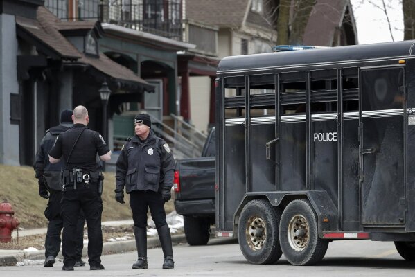 Police work outside the Molson Coors Brewing Co. campus in Milwaukee on Wednesday, Feb. 26, 2020, after reports of a possible shooting. (AP Photo/Morry Gash)