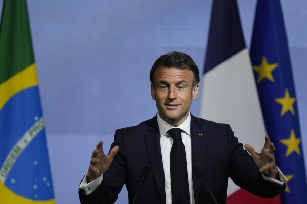 French President Emmanuel Macron speaks during a meeting with the business community at the Sao Paulo State Industries Federation, in Sao Paulo, Brazil, Wednesday, March 27, 2024. Macron is on a three-day official visit to Brazil. (AP Photo/Andre Penner)