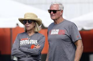 FILE - Cleveland Browns football owners Dee, left, and Jimmy Haslam watch the action during the fourth day of NFL football training camp, Sunday, July 28, 2019, in Berea, Ohio. Jimmy and Dee Haslam’s purchase of Marc Lasry’s 25% stake in the Milwaukee Bucks basketball team has received approval from the NBA’s board of governors. The approval announced Friday, April 14, 2023, enables the Haslams to join Wes Edens and Jamie Dinan as co-owners of the team. (John Kuntz/Cleveland.com via AP, File)