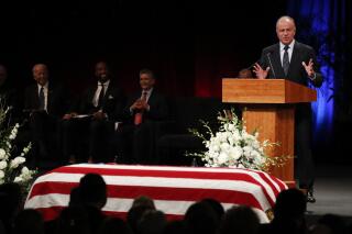 FILE - Former Arizona Attorney General Grant Woods gives a tribute during a memorial service for Sen. John McCain, R-Ariz., at North Phoenix Baptist Church on Aug. 30, 2018, in Phoenix. Woods, a longtime Republican loyalist who changed his registration to Democratic in 2018 because of his frustration at the party's direction and then-President Donald Trump, died Saturday, Oct. 23, 2021, at the age of 67.  (AP Photo/Jae C. Hong, Pool, File)